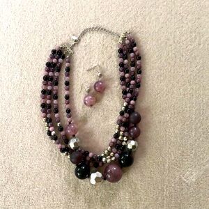 Chunky beaded necklace with matching earrings.